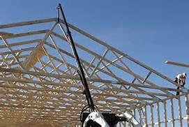 Teleboom Attachment for a Track Loader
